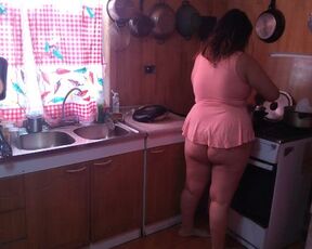 Chubby stepmom cooking while showing off her beautiful legs