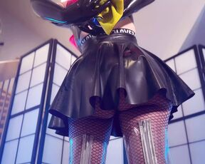 Pink haired Luvie Doll is shining up her big juicy latex ass with long opera latex gloves in fishnets and transparent boots