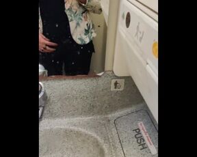 Pad bulge and Pissing Fetish in Airplane Toilet