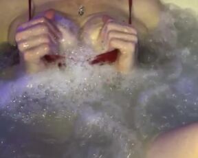 Hot MILF Step Mom in the Hot Tub. Teasing and showing off titties.