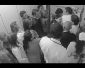 Doctor Groping Nurse In Elevator Full Of People