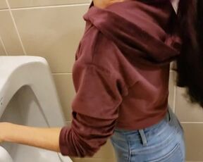 Naughty Girl Sneaks into Mens Urinal