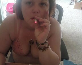 Sexy brunette smoking 420